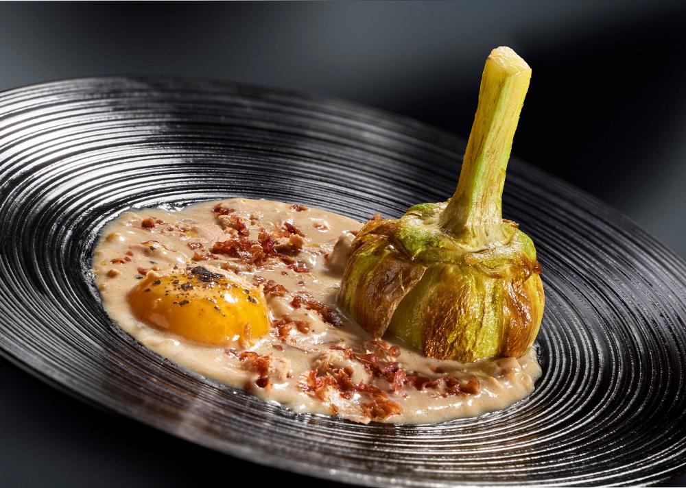 Artichoke dish with egg and ham